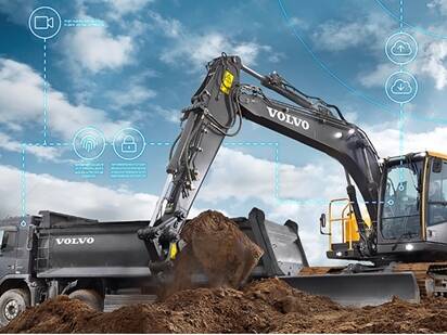 Excavator loading a truck